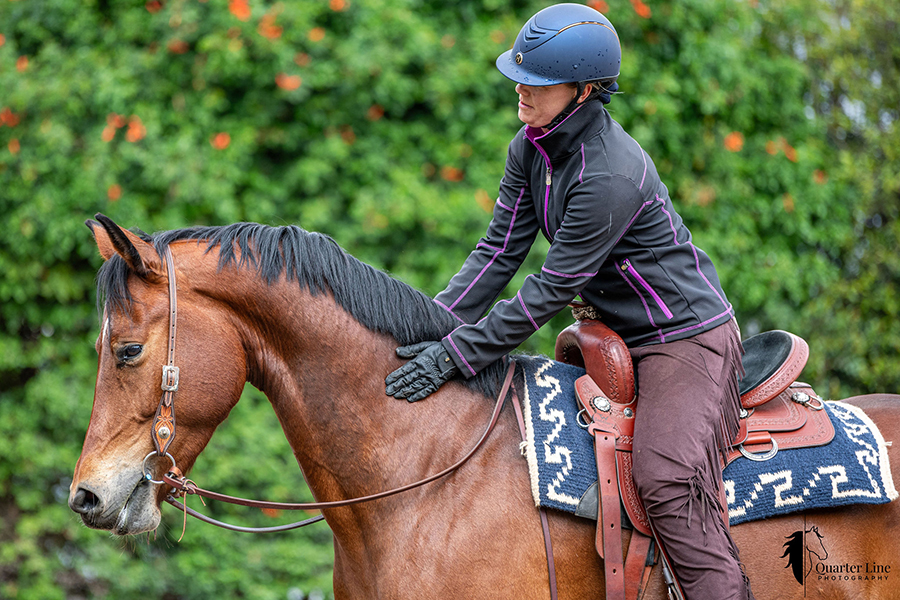 Rider using a lightweight western dressage saddle by TW Saddlery