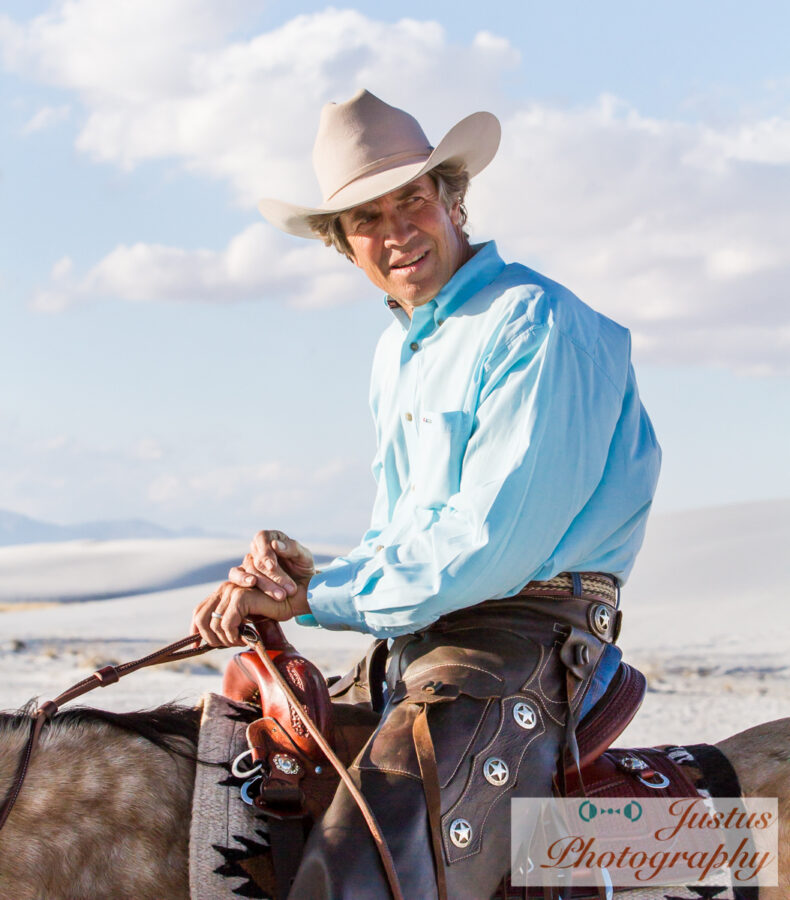 David Kaden riding in a TW Saddlery saddle at White Sands National Monument