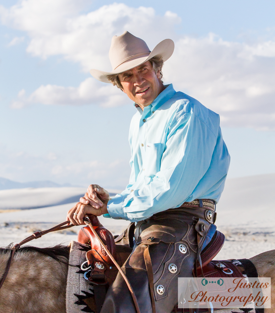 David Kaden riding in a TW Saddlery saddle at White Sands National Monument