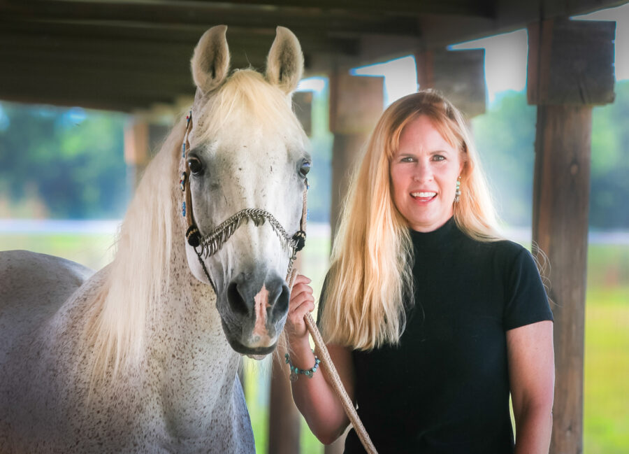 Tracy Webb-Kaden with Flight Leader, the horse behind the name Flight Leader Farm