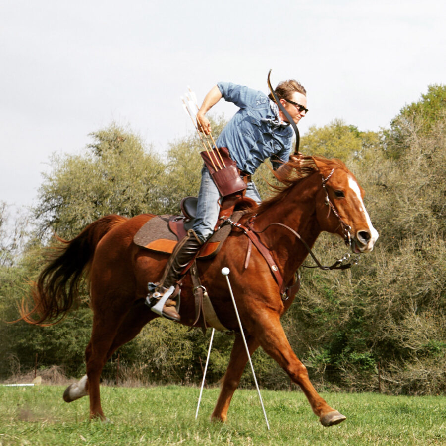 Thoroughbred ridden in a TW Saddlery trail saddle during mounted archery