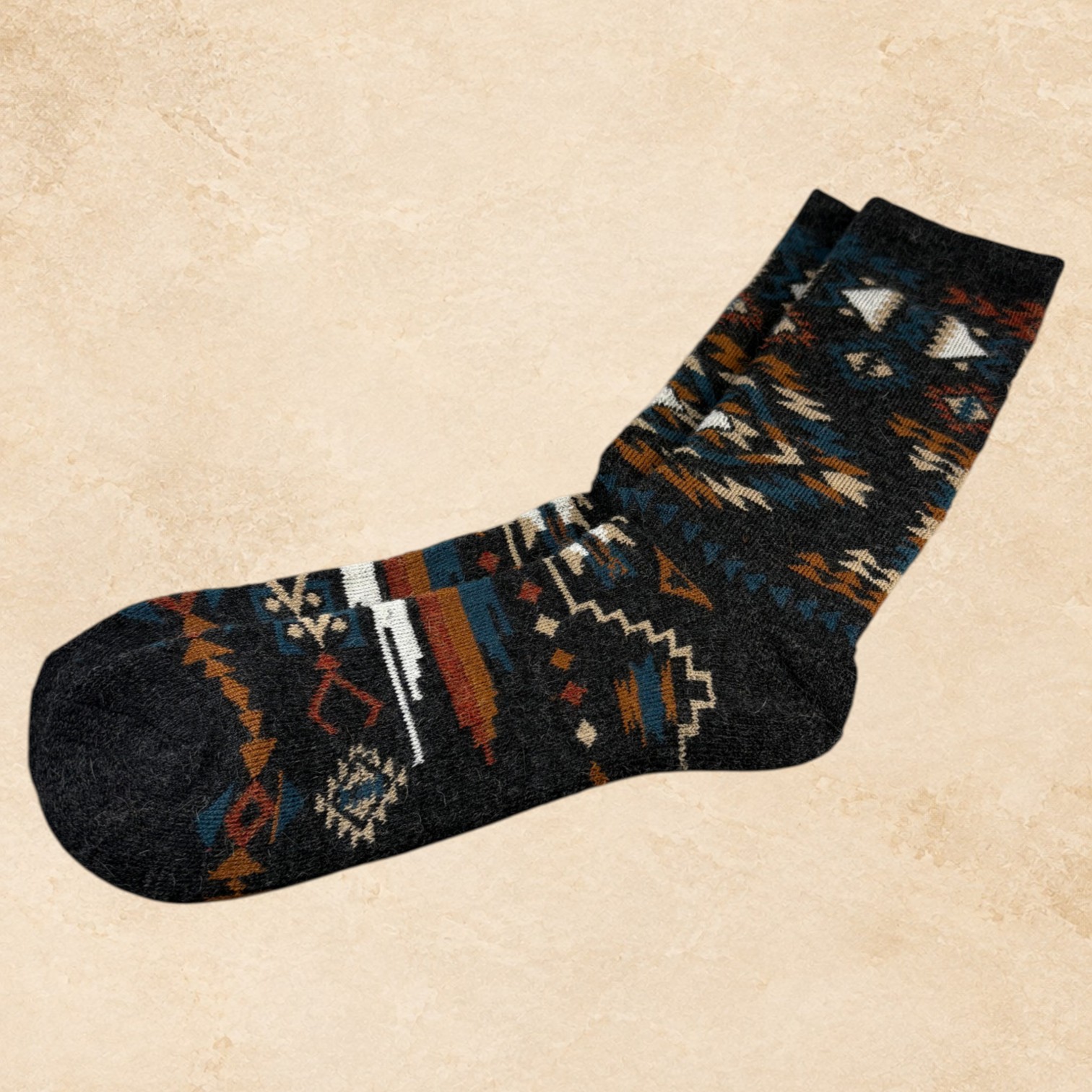 Women’s red 50% alpaca crew socks with a Western-inspired pattern, shown as a soft luxury sock style.