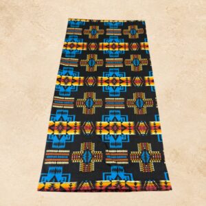 Thunder Mesa tea towel with a black background and vibrant turquoise, yellow, orange, red, and cream Southwestern geometric patterns.