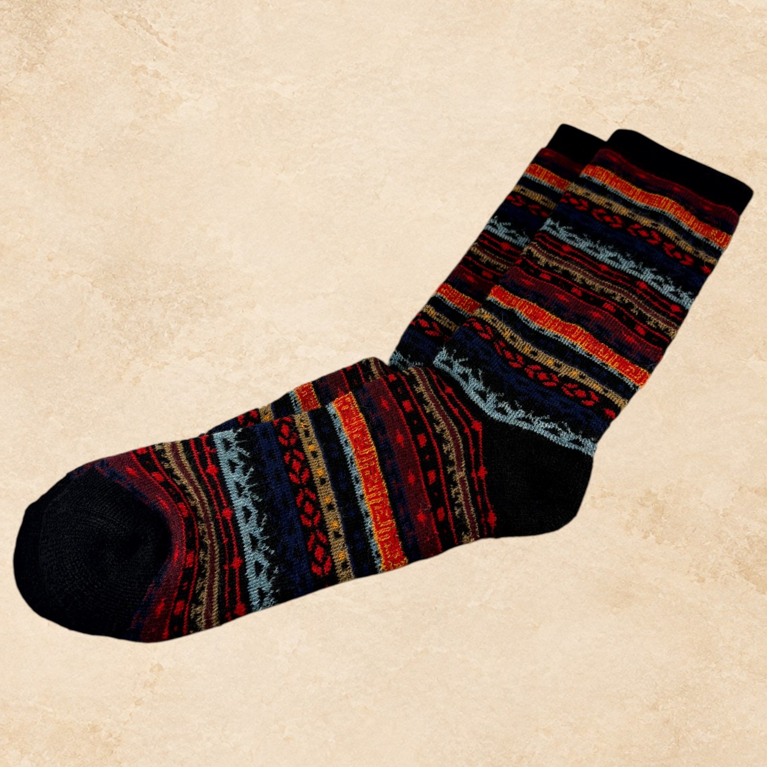 Women’s black 50% alpaca crew socks with a Western-inspired pattern, shown as a soft luxury sock style.