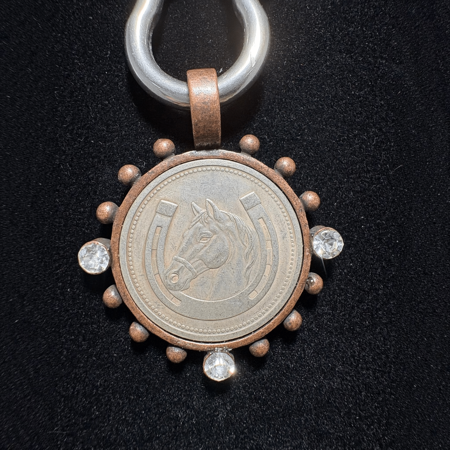Handmade copper and silver necklace with round horse pendant