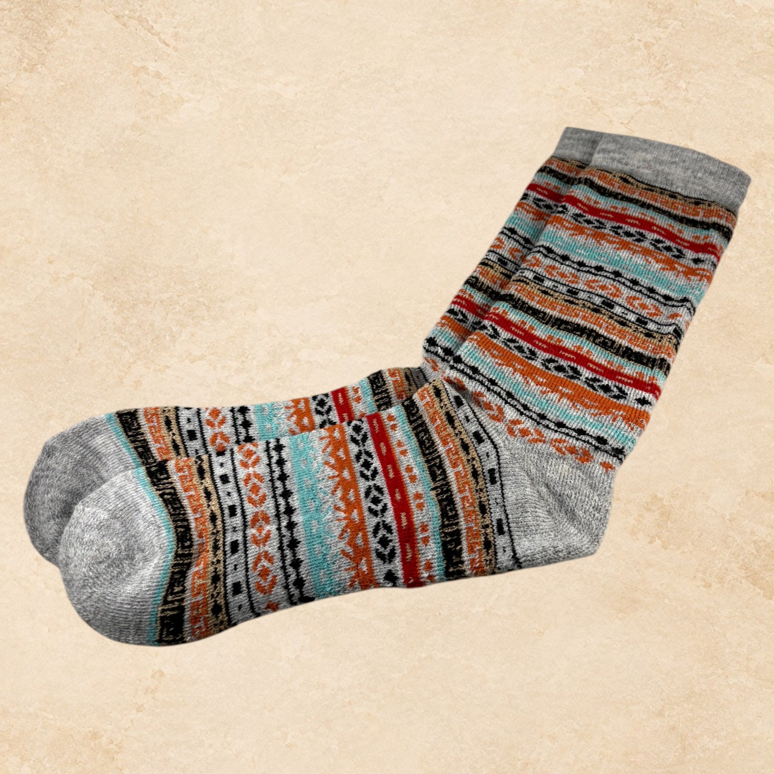 Women’s grey 50% alpaca crew socks with a Western-inspired pattern, shown as a soft luxury sock style.