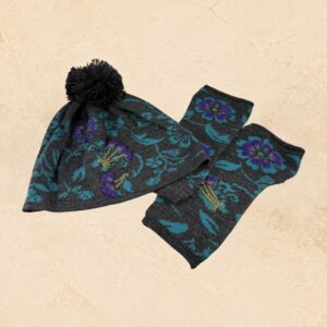Charcoal knit beanie and fingerless glove set with turquoise western pattern and purple floral embroidery