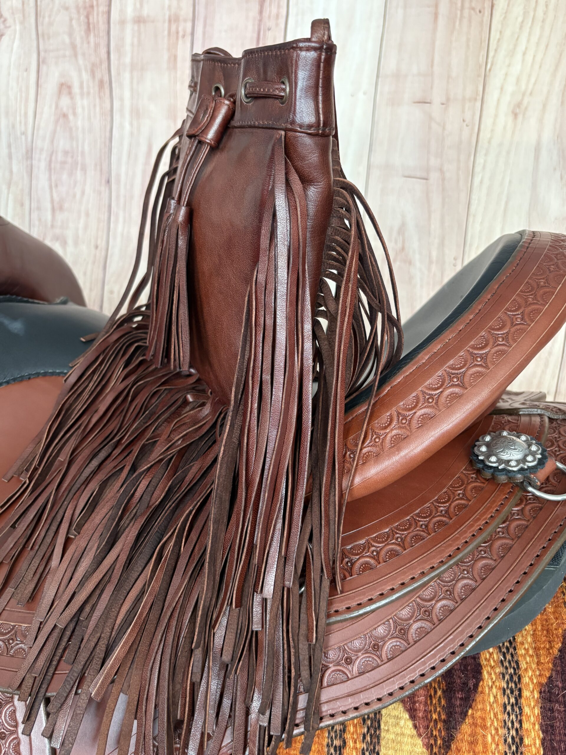 One-of-a-kind handmade dark brown leather Western purse with layered fringe and leather tie closure