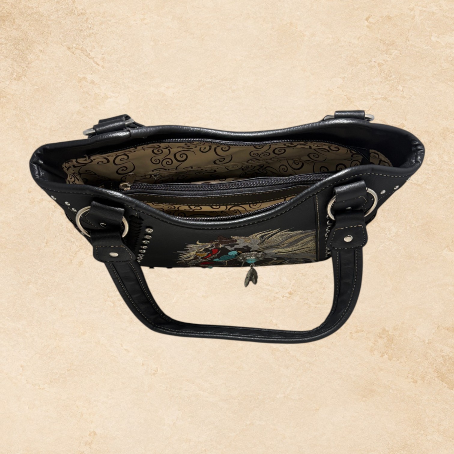 Interior view of black embroidered horse leather purse