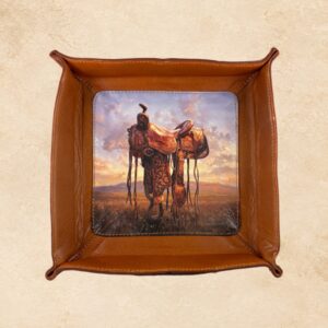 Brown leather catch-all tray featuring a Western saddle scene with a sunset landscape.