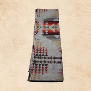 Light gray Southwestern scarf with brown, rust red, yellow, and charcoal geometric patterns