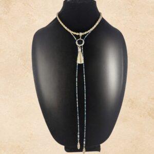 Silver Sky Lariat Horsehair Necklace with braided light horsehair, blue and silver beads, silver-tone hardware, horsehair tassel and feather charms.