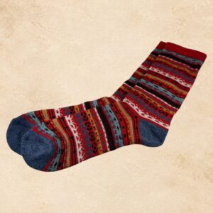 Soft red women’s alpaca socks with a Western-inspired pattern.