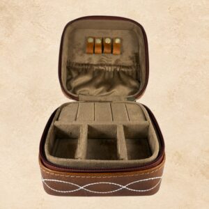Brown Desert Stitch jewelry box open with soft interior, divided compartments, and jewelry holder loops.