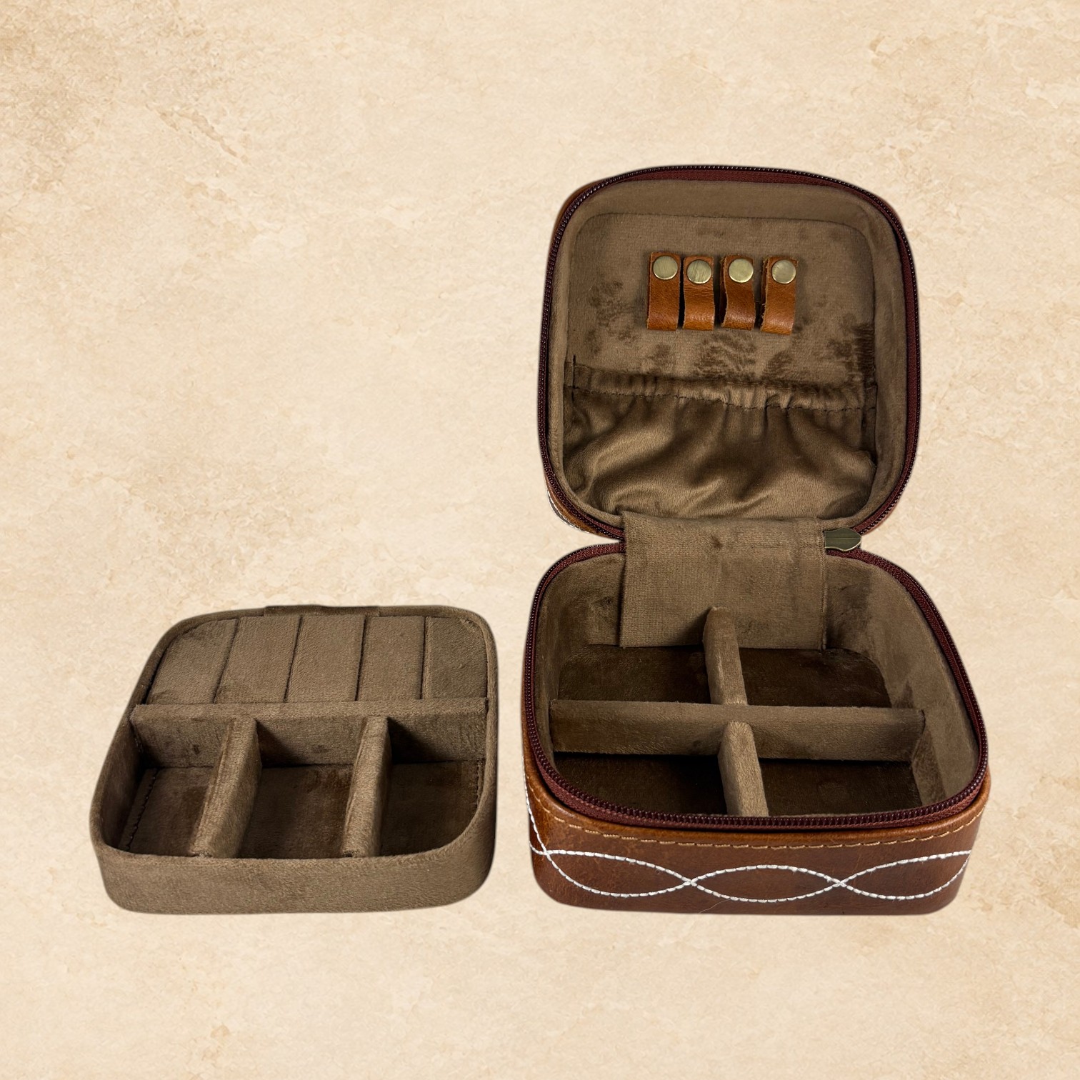 Brown Desert Stitch jewelry box open with soft interior, divided compartments, and jewelry holder loops.