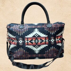 Sundown Mesa western weekender bag with black, cream, rust and dusty rose Southwestern geometric pattern, top handles and shoulder strap