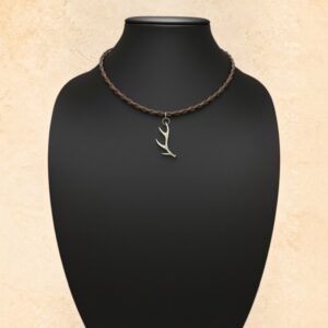 Brown real horsehair necklace in a four-strand round braid with a silver-tone shed antler pendant.