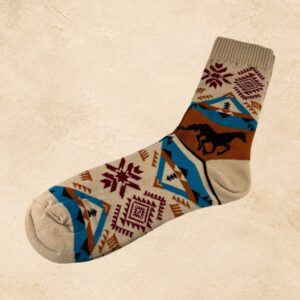 Women’s tan crew socks with rust and turquoise Southwestern patterns and a black running horse design.