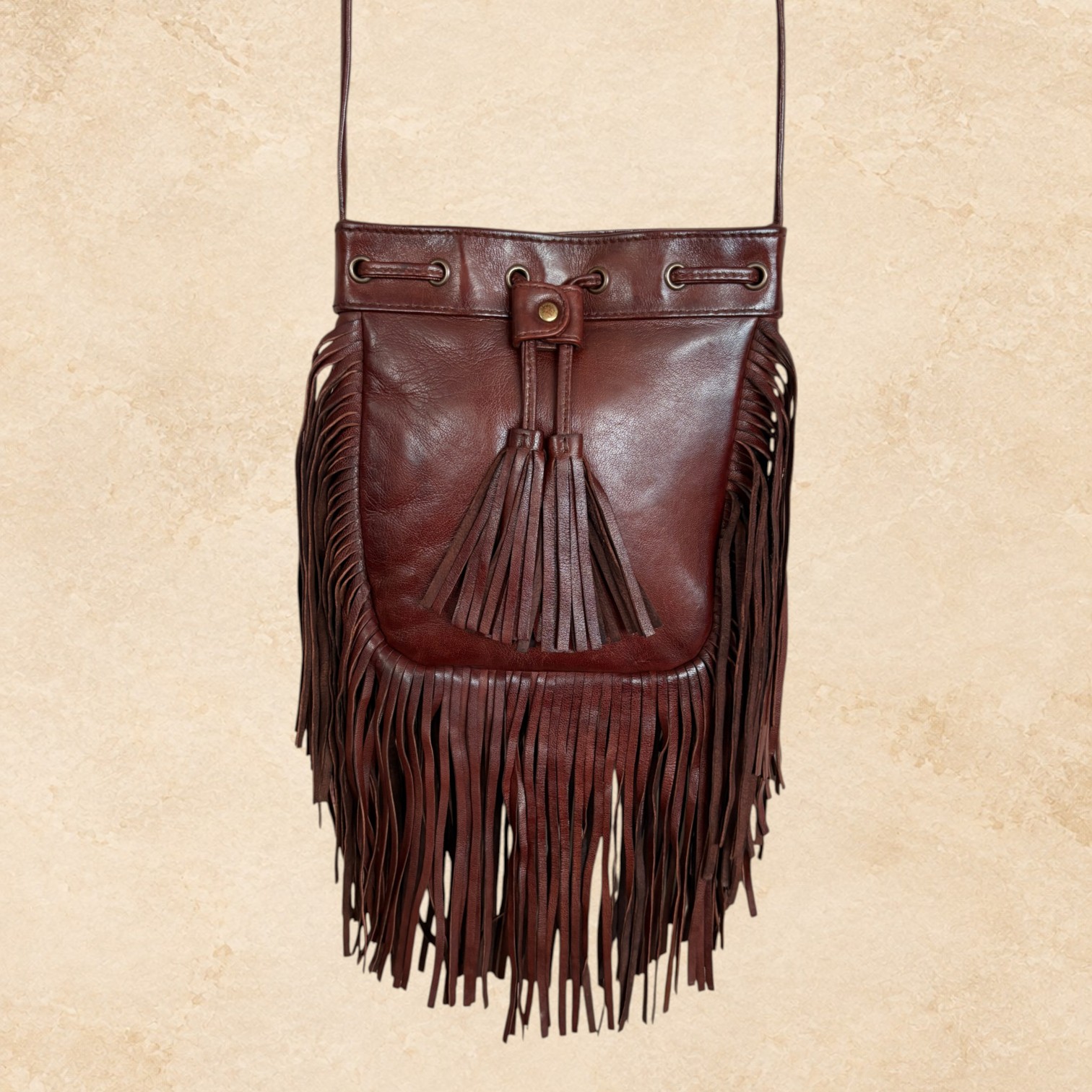 One-of-a-kind handmade dark brown leather Western purse with layered fringe and leather tie closure