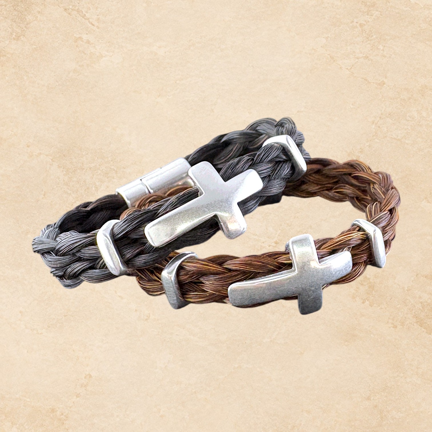 Crossroads Horsehair Bracelets featuring braided brown and black horsehair with silver cross accents.