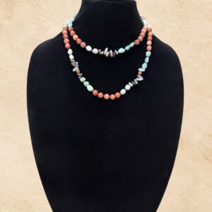 Jasper Mint and Pearls long beaded necklace featuring warm coral and peach Jasper stones, pale mint-green Amazonite beads, lustrous freshwater pearls, and mixed free-form Agate nuggets. A beautiful combination of natural gemstones that can be worn long or doubled for a layered look.