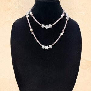 Three Star Rose long continuous strand necklace featuring genuine rose quartz star-shaped beads, delicate pink butterfly beads, lustrous freshwater pearls, and gold accent beads. Designed to be worn long or doubled for a beautiful layered look.