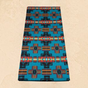 Turquoise Zia tea towel with colorful Southwestern geometric pattern in red, orange, black, and turquoise.